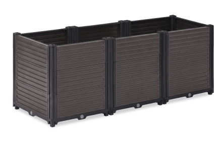 Pestovateľský box Cultivo GROW BOX PLUS L s kvitnúcimi narcismi umiestnený na záhrade